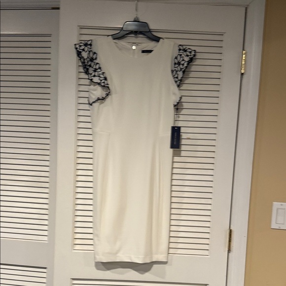 Tommy Hilfiger Dresses & Skirts - Tommy Hilfiger Cream Dress with Black Floral Sleeves
